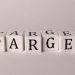 White cubes spelling 'TARGET' on a neutral background, ideal for business or marketing concepts.